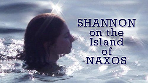 Shannon swims on a beach in Naxos, Greece